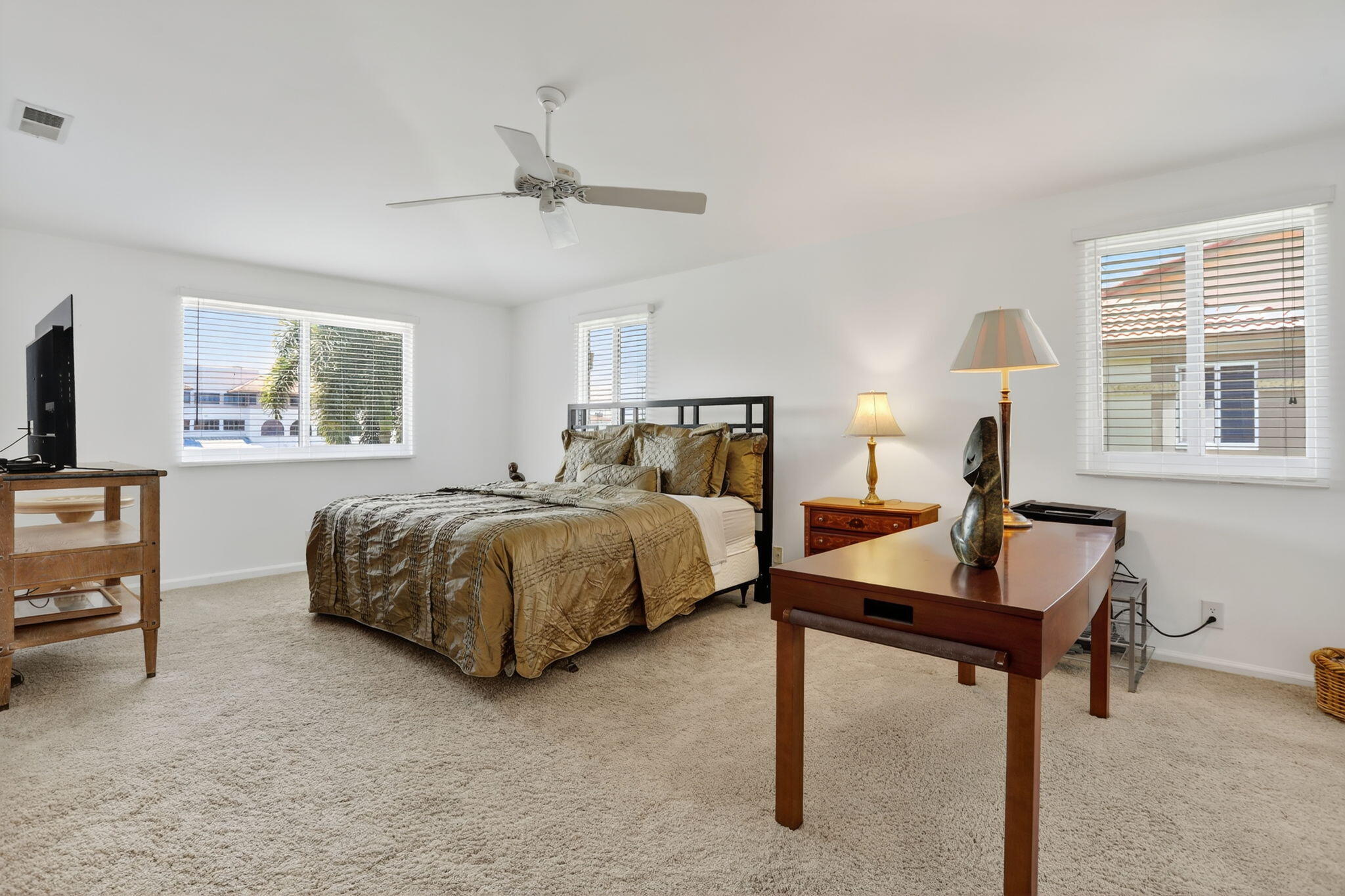 6806 Via Regina Boca Raton, FL 33433 - Photo 30 of 51 a bedroom with a bed and a table