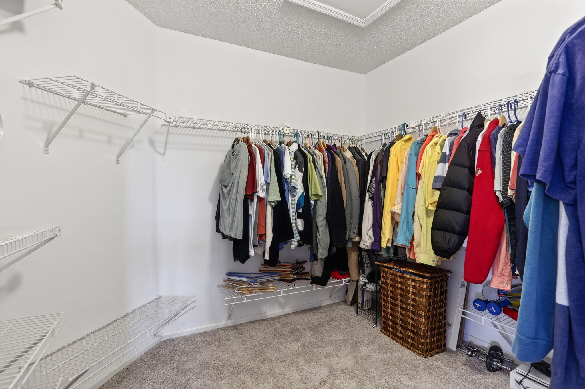 6806 Via Regina Boca Raton, FL 33433 - Photo 36 of 51 a view of walk in closet with clothes