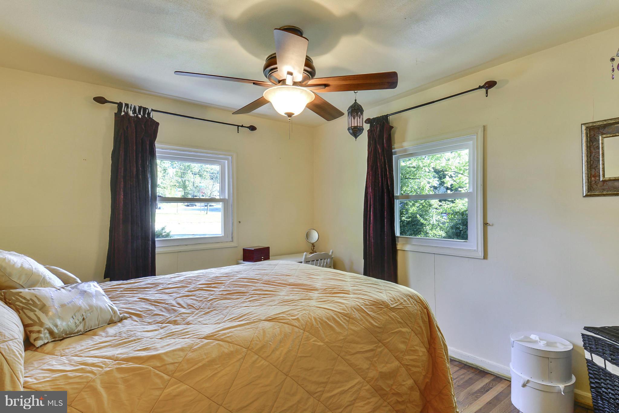 4400 Garrett Park Road Silver Spring, MD 20906 - Photo 13 of 30 a bedroom with a bed and a window