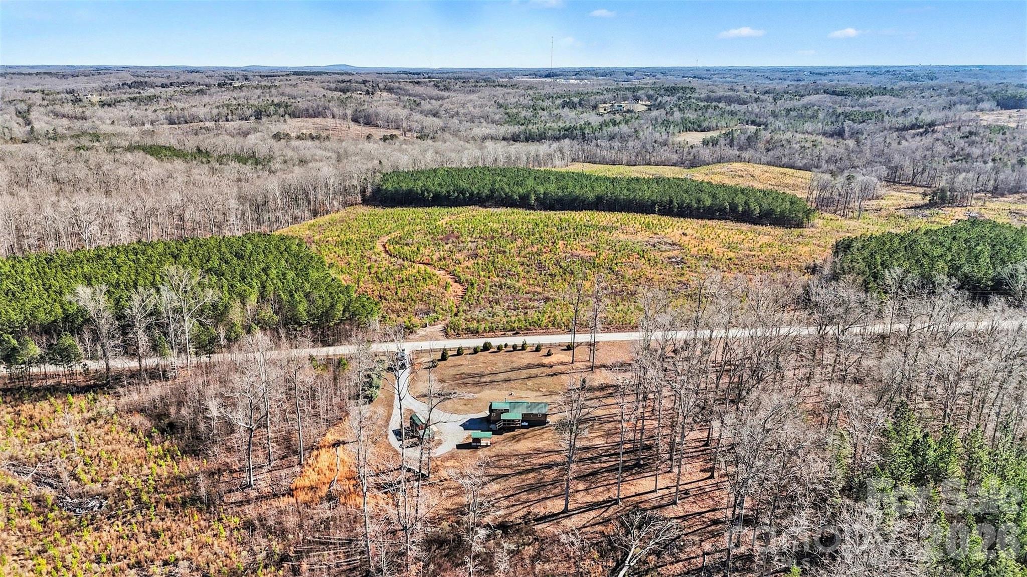 807 C E Stewart Road Clover, SC 29710 - Photo 20 of 25 a view of a yard with wooden fence