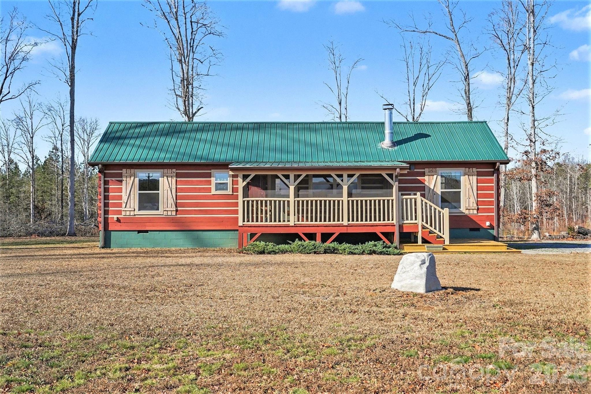 807 C E Stewart Road Clover, SC 29710 - Photo 2 of 25 a front view of a house with a yard