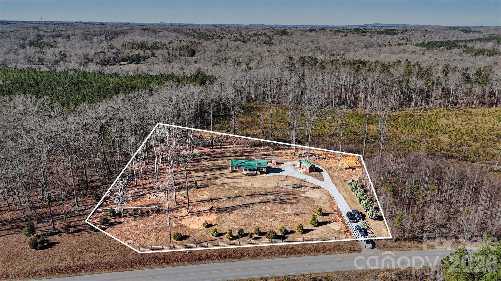 807 C E Stewart Road Clover, SC 29710 - Photo 21 of 25 a view of a fireplace in a field