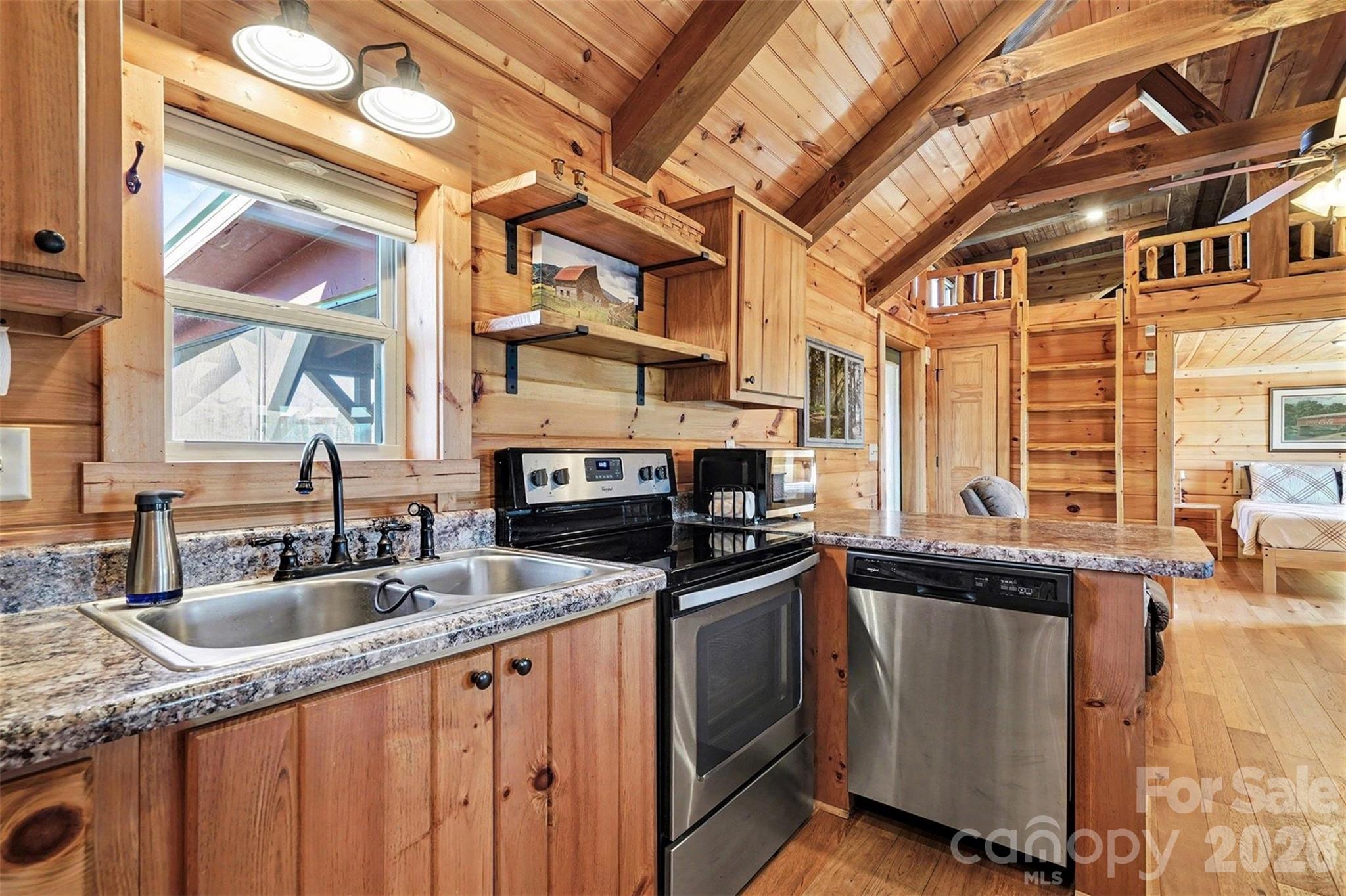 807 C E Stewart Road Clover, SC 29710 - Photo 7 of 25 a kitchen with stainless steel appliances granite countertop a sink and a stove