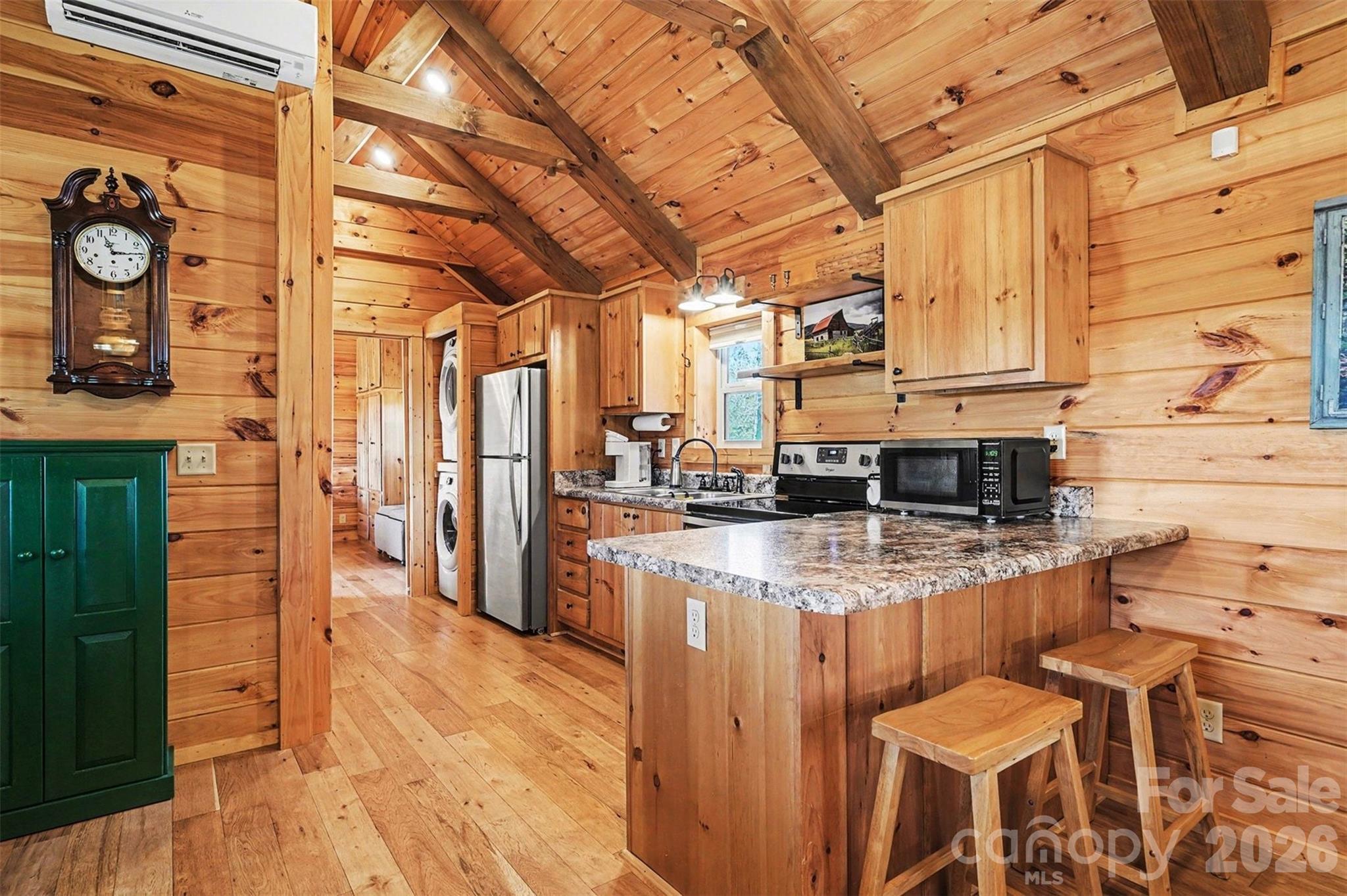 807 C E Stewart Road Clover, SC 29710 - Photo 8 of 25 a kitchen with stainless steel appliances granite countertop a stove a sink and a refrigerator