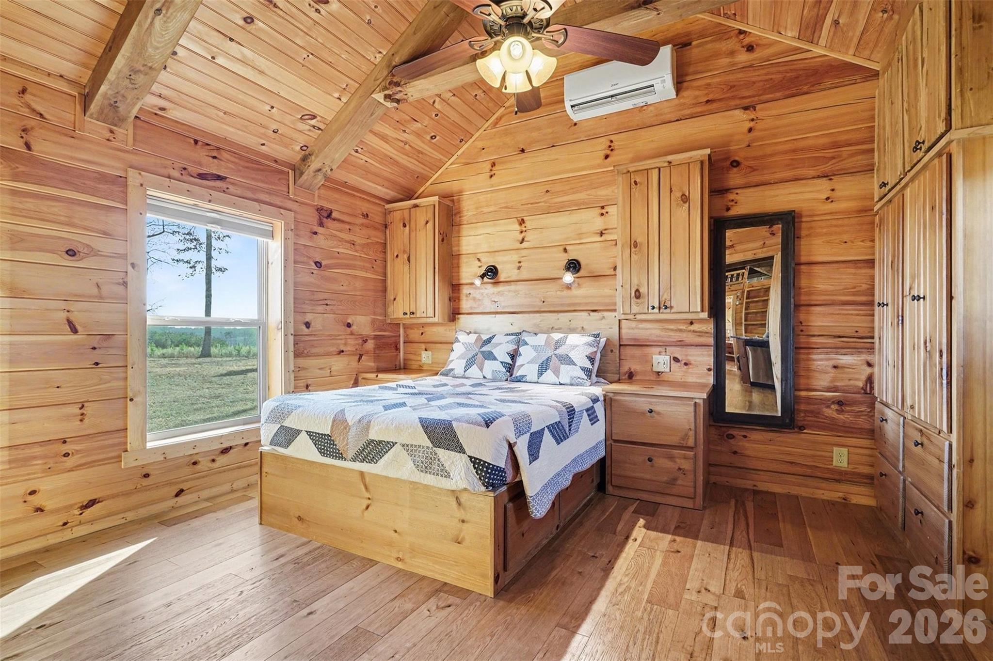 807 C E Stewart Road Clover, SC 29710 - Photo 9 of 25 a bed sitting in a spacious bedroom next to a window