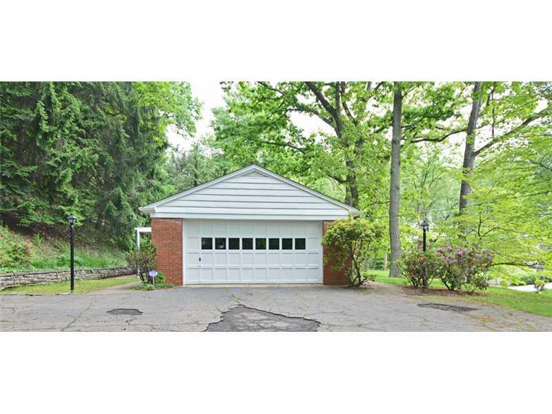 627 West Waldheim Road Fox Chapel, PA 15215 - Photo 6 of 22 Other. The wide driveway provides ample space for at least four cars to park while still affording easy entry and exit for each.