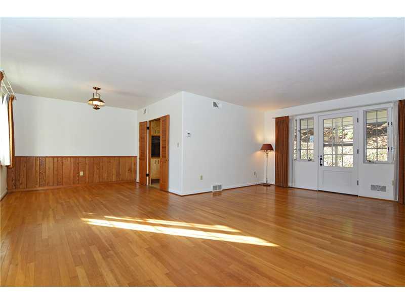 627 West Waldheim Road Fox Chapel, PA 15215 - Photo 8 of 22 Dining Room. The wide-open living room leads to the dining room and kitchen.