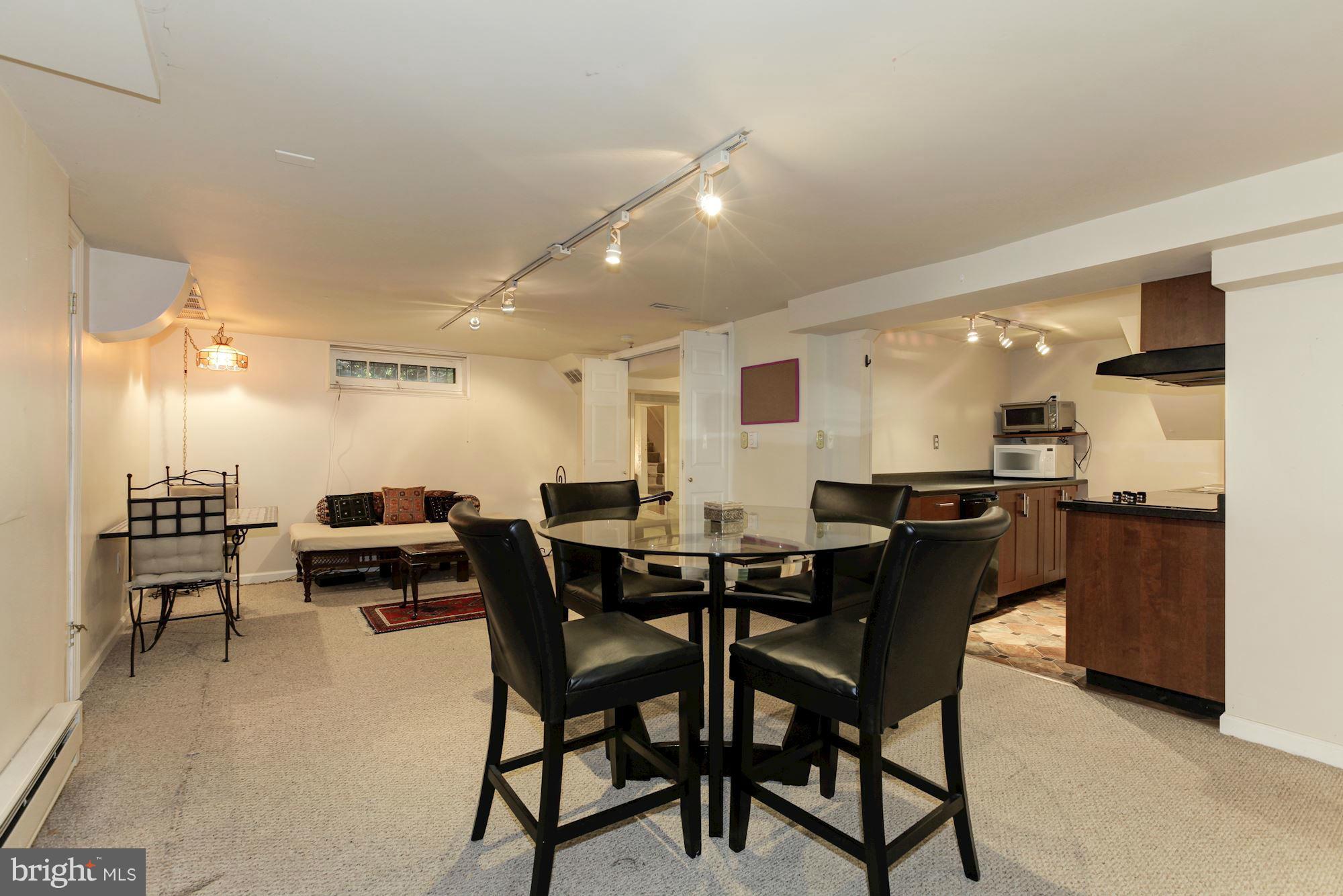 1743 Webster Street Northwest Washington, DC 20011 - Photo 20 of 24 a view of a dining area with furniture