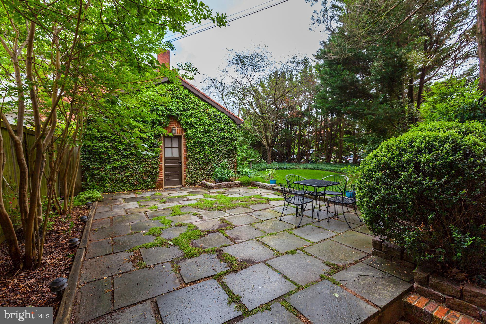 1743 Webster Street Northwest Washington, DC 20011 - Photo 23 of 24 a backyard of a house with outdoor seating