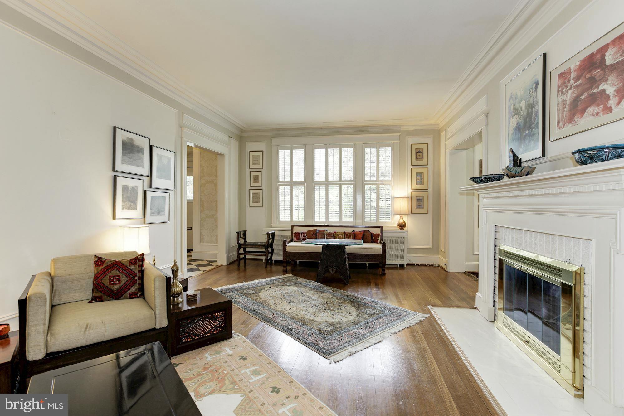 1743 Webster Street Northwest Washington, DC 20011 - Photo 4 of 24 a living room with furniture and a fireplace