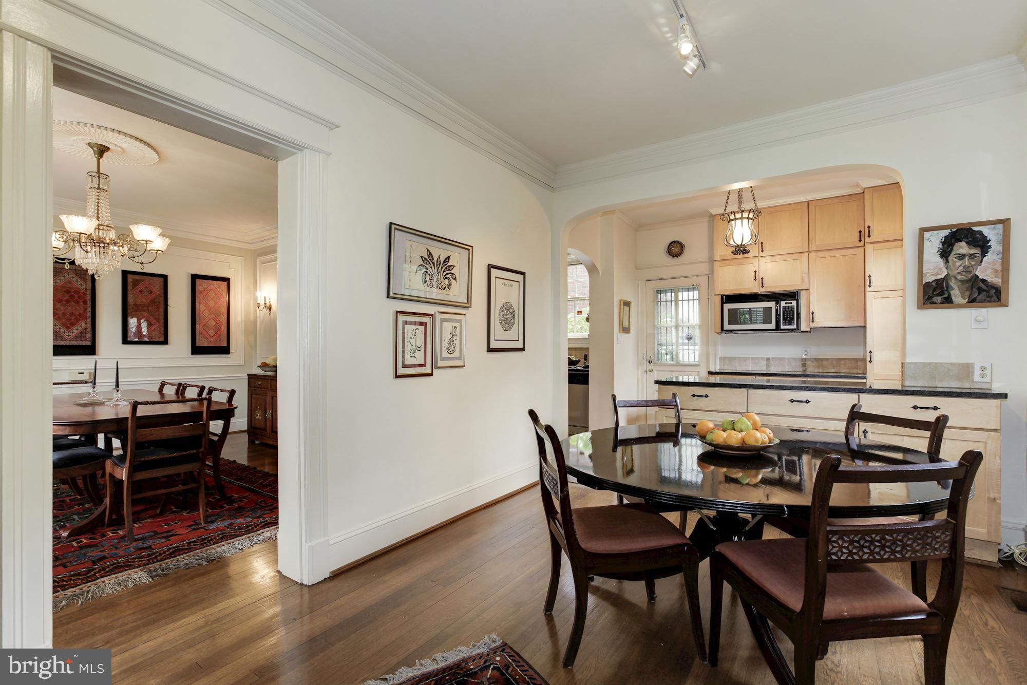 1743 Webster Street Northwest Washington, DC 20011 - Photo 9 of 24 a dining room with furniture and wooden floor