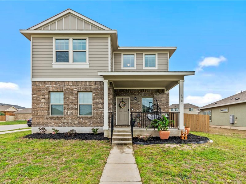 8201 Daisy Cutter Crossing Georgetown, TX 78626 - Photo 1 of 31 View of front of home featuring covered porch and brick siding