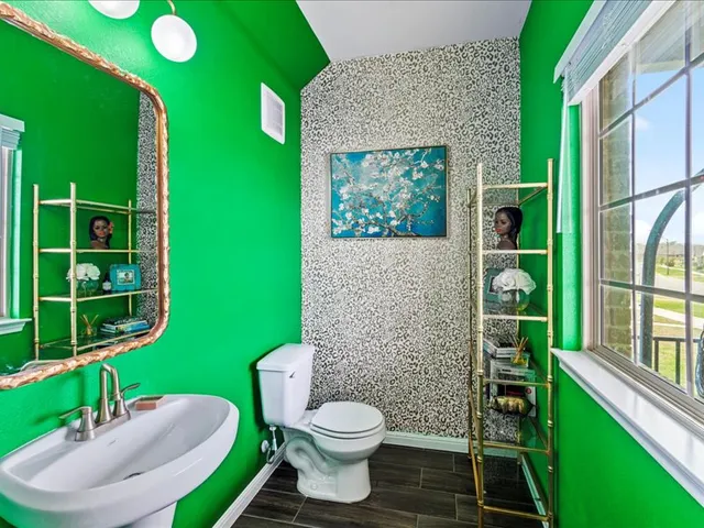 a side view of a house with a yard