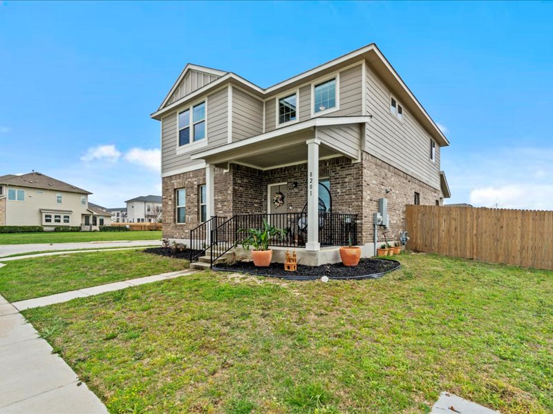 8201 Daisy Cutter Crossing Georgetown, TX 78626 - Photo 2 of 31 View of front of property with a porch and brick siding