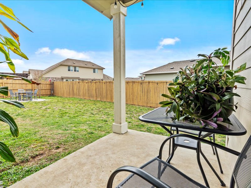 8201 Daisy Cutter Crossing Georgetown, TX 78626 - Photo 24 of 31 Fenced backyard featuring a patio area and outdoor dining space