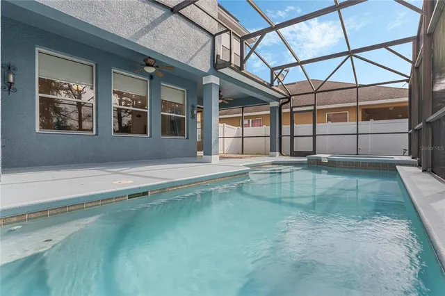 a view of a house with a swimming pool