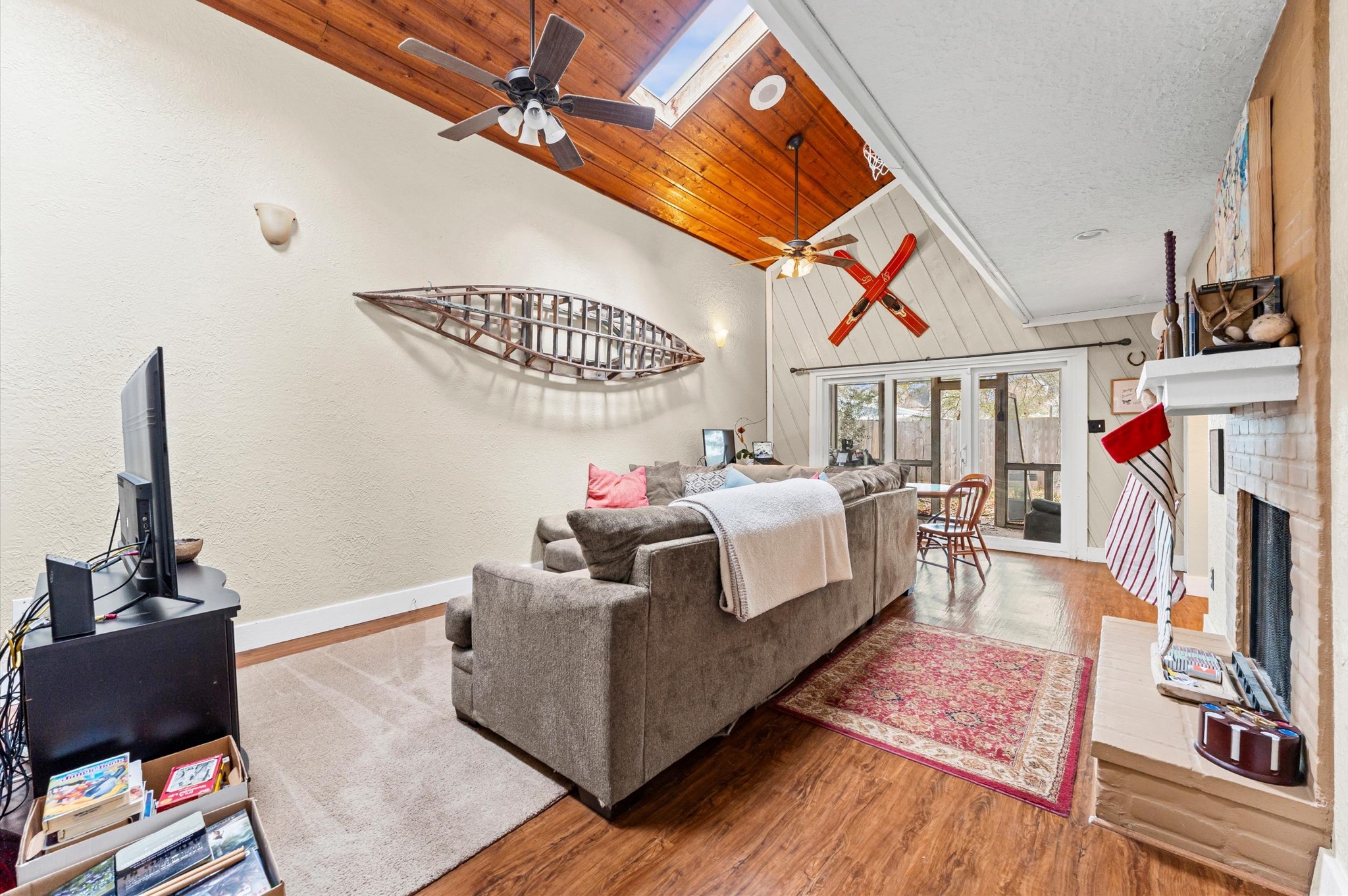 1504 Early Lane Houston, TX 77055 - Photo 6 of 23 a living room with furniture and a flat screen tv