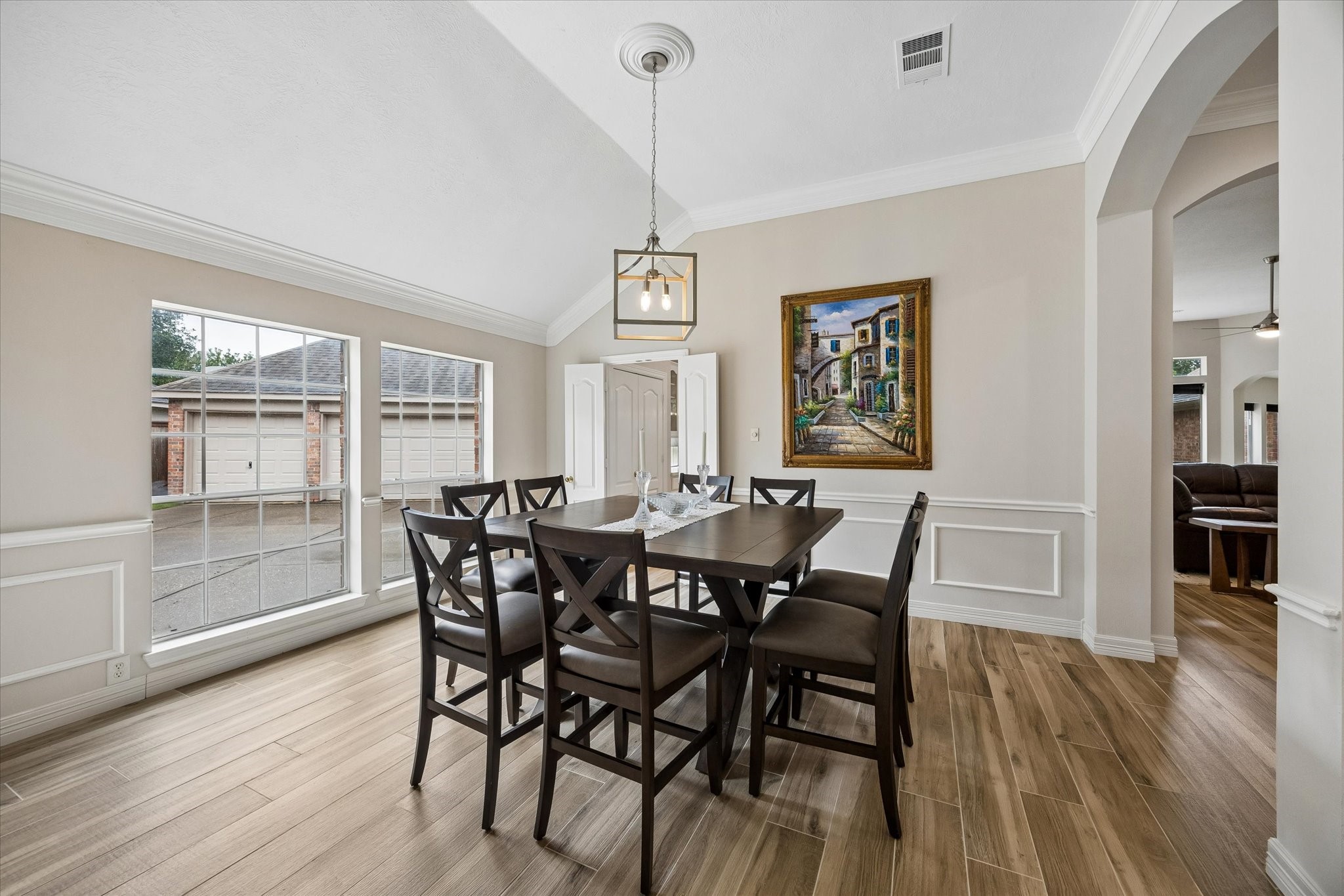5306 Summerland Ridge Court Houston, TX 77041 - Photo 6 of 33 a view of a dining room with furniture window and wooden floor