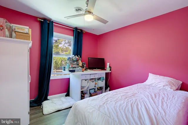 a view of roof deck with large trees