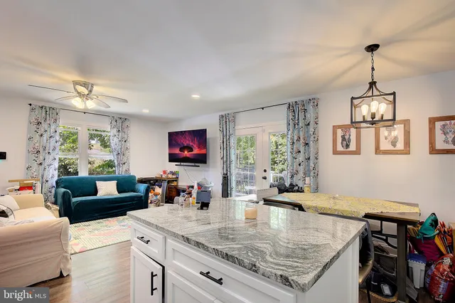 a view of a living room and dining room