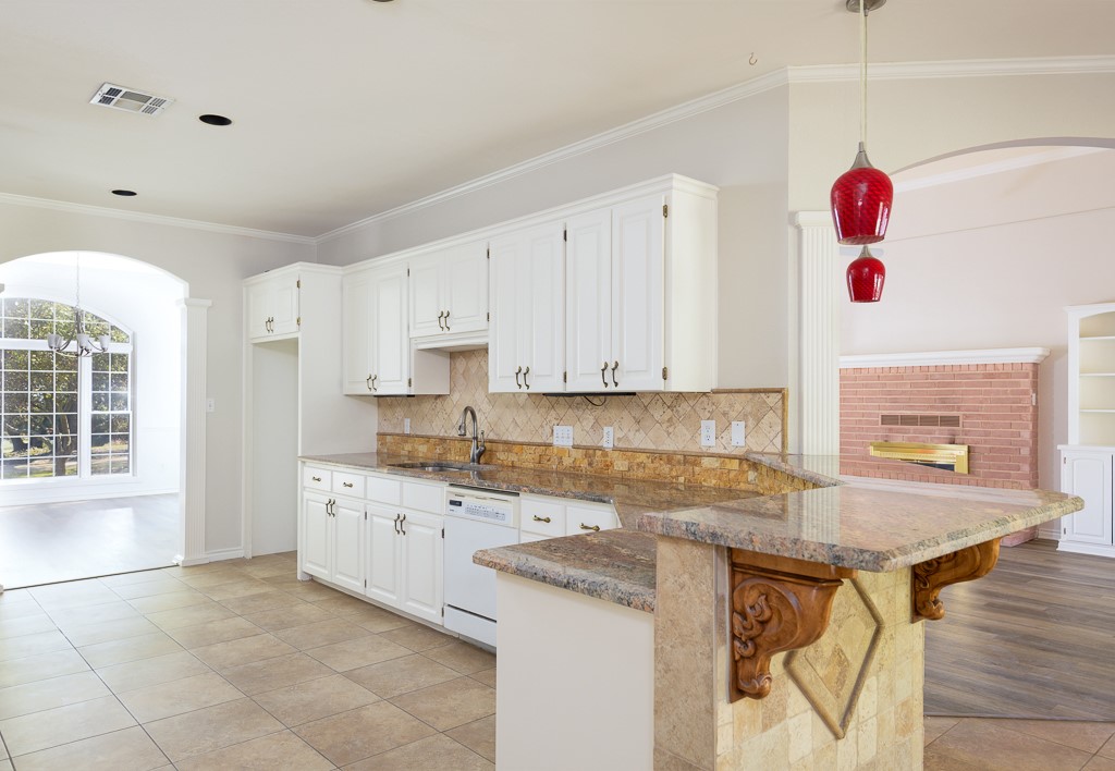 4488 Blue Ridge Drive Belton, TX 76513 - Photo 11 of 35 a kitchen with granite countertop a sink and a stove
