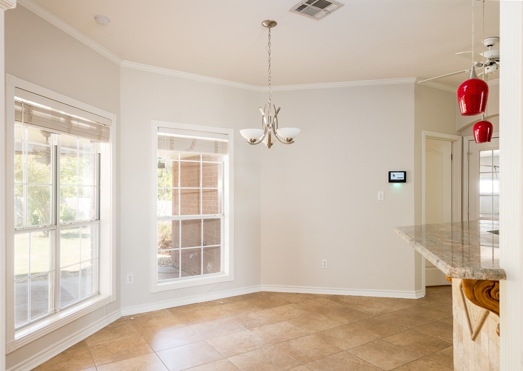 4488 Blue Ridge Drive Belton, TX 76513 - Photo 12 of 35 a view of an entryway with wooden floor and windows