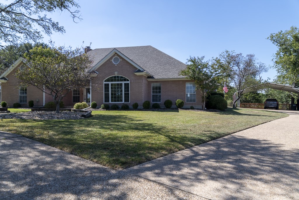 4488 Blue Ridge Drive Belton, TX 76513 - Photo 4 of 35 a front view of a house with a yard