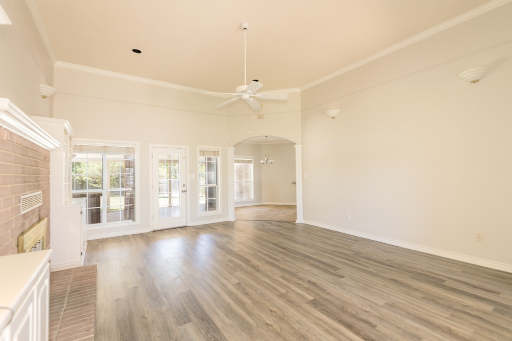 4488 Blue Ridge Drive Belton, TX 76513 - Photo 8 of 35 a view of an empty room with wooden floor and a window