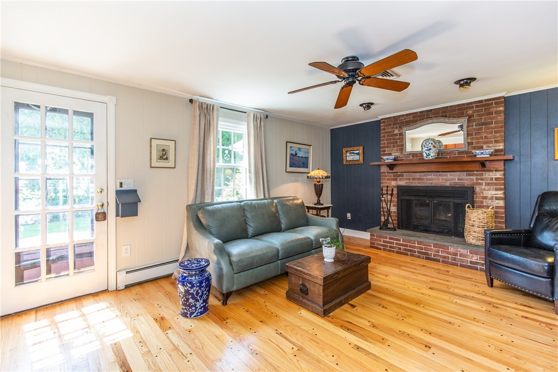 65 Thunder Trail Cranston, RI 02921 - Photo 16 of 49 Family room with hardwood floors