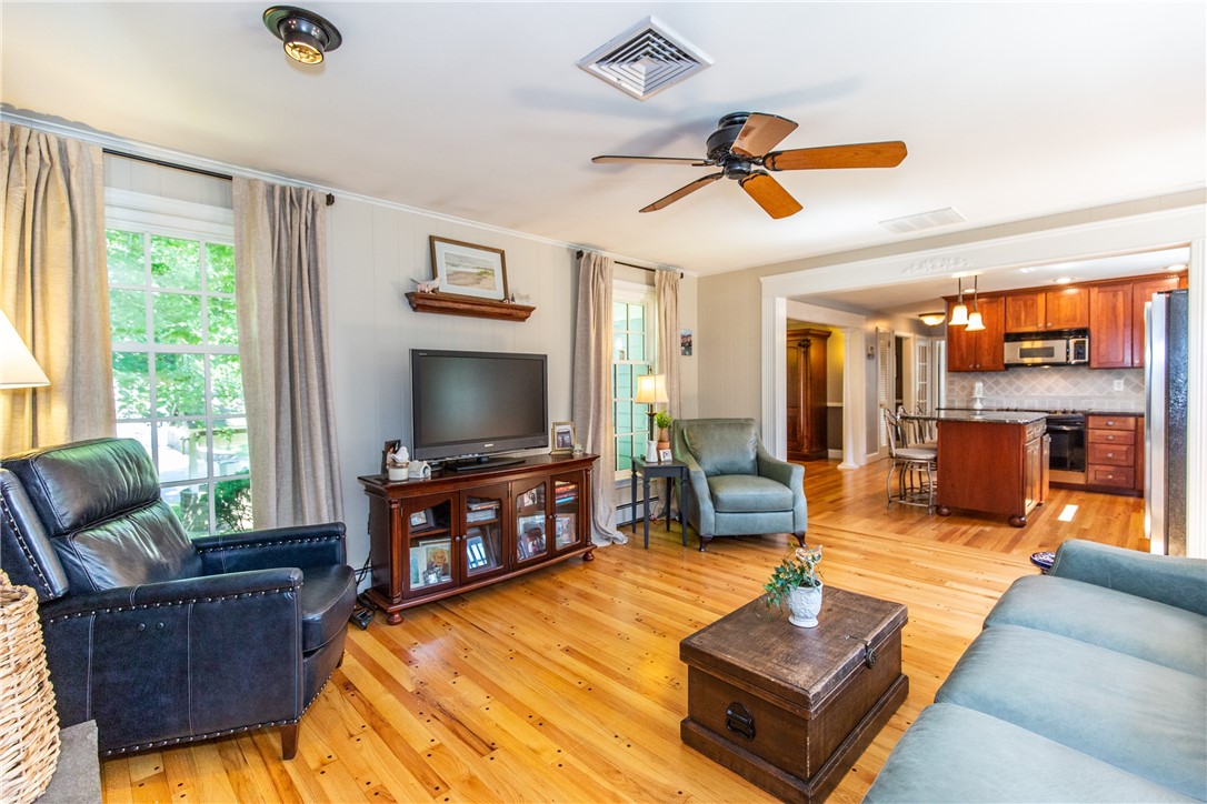 65 Thunder Trail Cranston, RI 02921 - Photo 17 of 49 Family room and kitchen