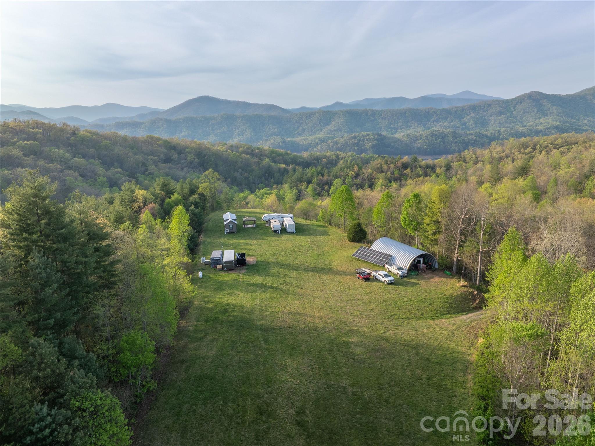 8888 Yellow Branch Road Robbinsville, NC 28771 - Photo 7 of 28 a view of outdoor space and mountain view