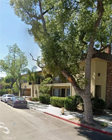 a view of a building with a street