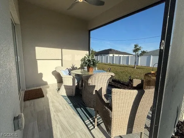 a view of front door and yard