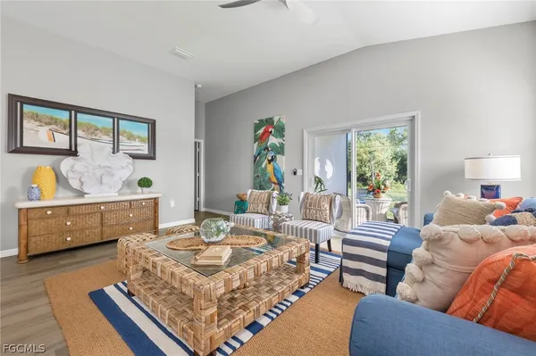 a living room with furniture and a window