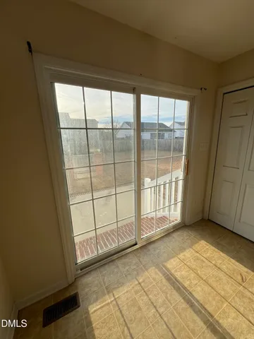 a kitchen with stainless steel appliances a stove and a refrigerator