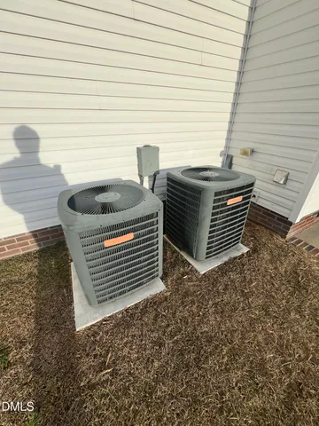 a view of barbeque area with seating