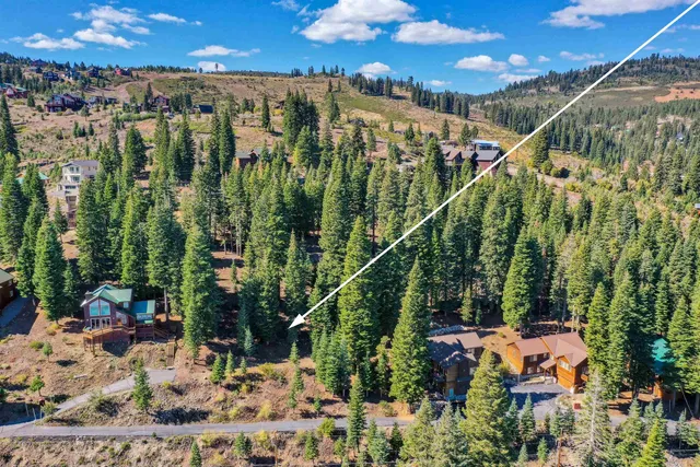 a view of a city with mountains