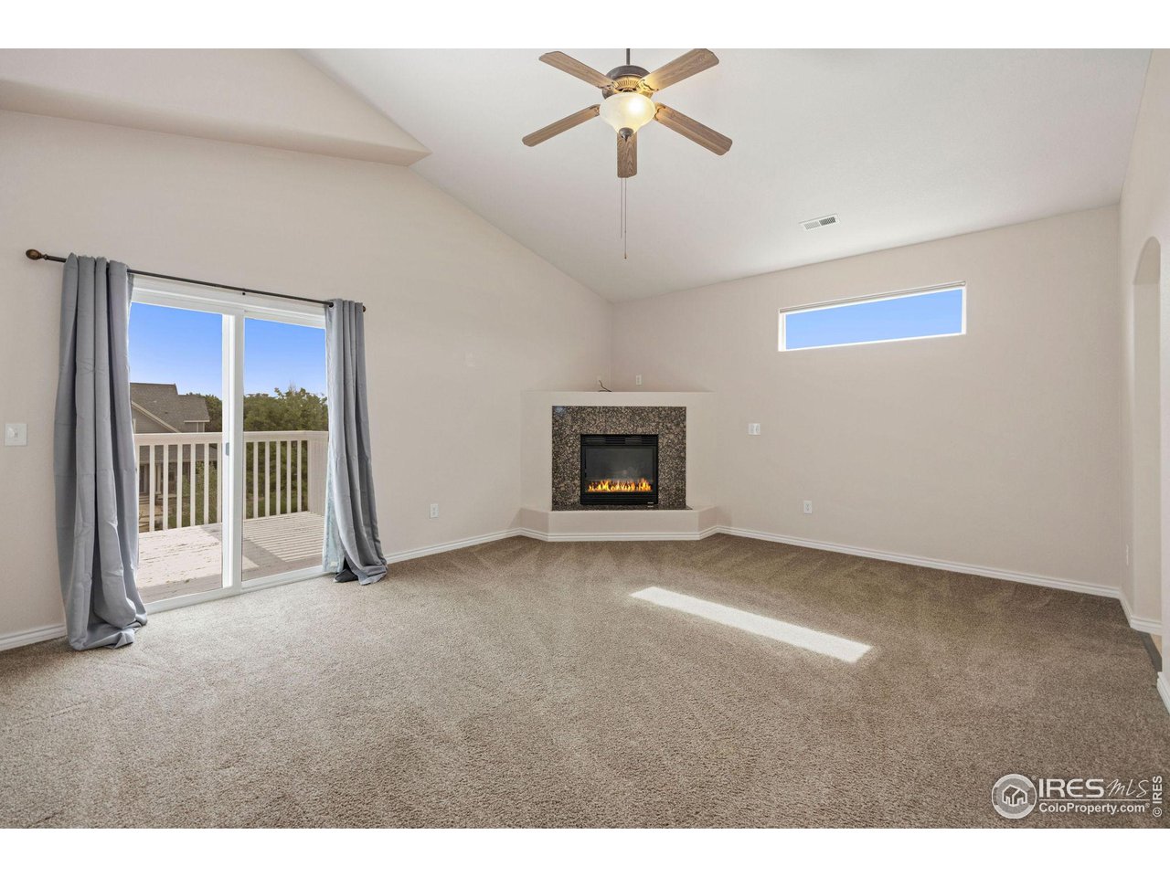 3427 Red Hawk Lane Longmont, CO 80504 - Photo 14 of 33 a view of empty room with fireplace
