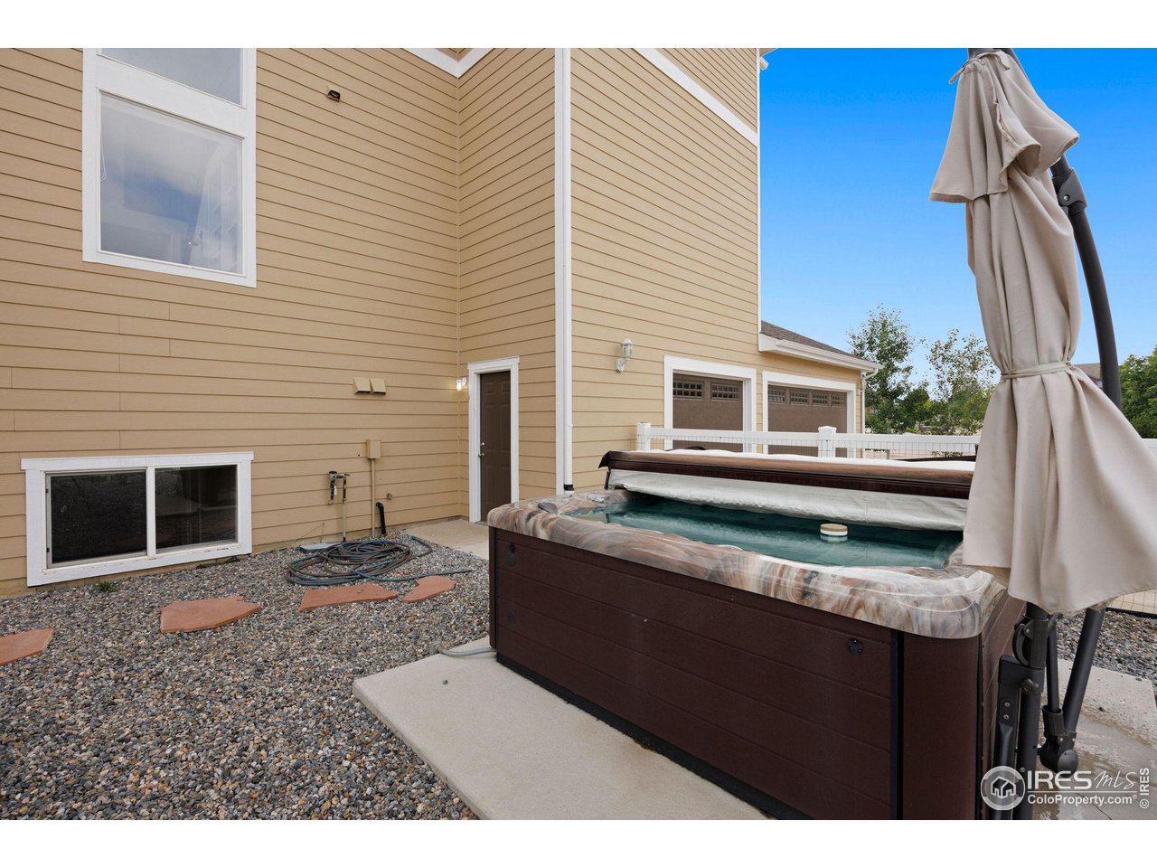 3427 Red Hawk Lane Longmont, CO 80504 - Photo 33 of 33 a view of a house with large windows