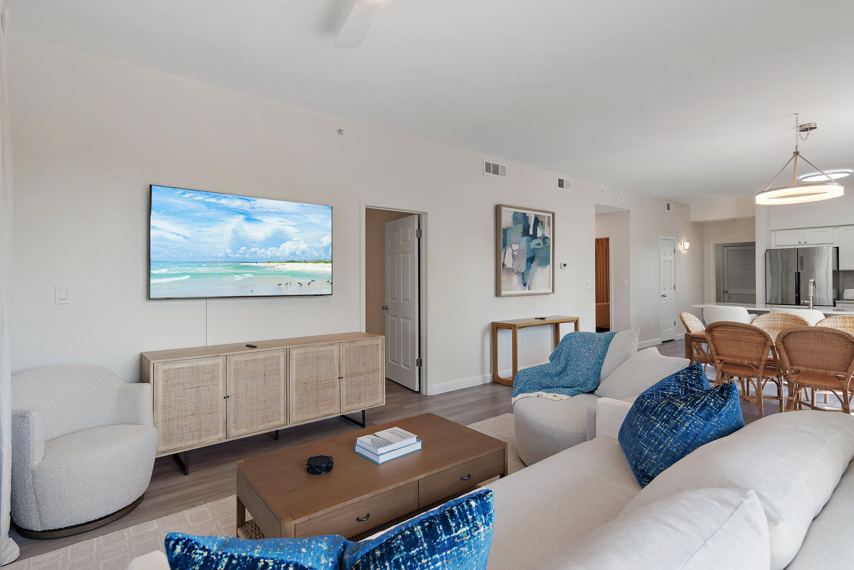 970 Highway 98, Unit 107 Destin, FL 32541 - Photo 7 of 28 a living room with furniture and a table