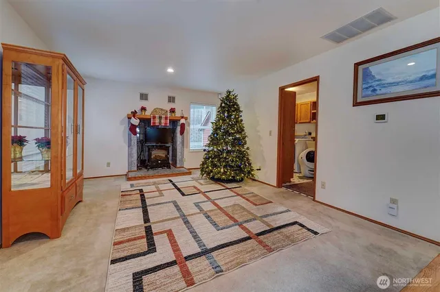 a living room with a couch and a window
