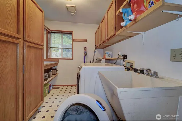 a bathroom with a sink and a window