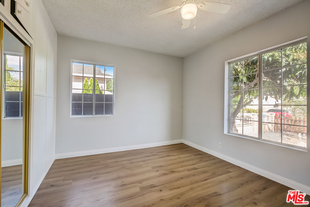 2019 Broach Avenue Duarte, CA 91010 - Photo 26 of 35 a view of an empty room with wooden floor and a window
