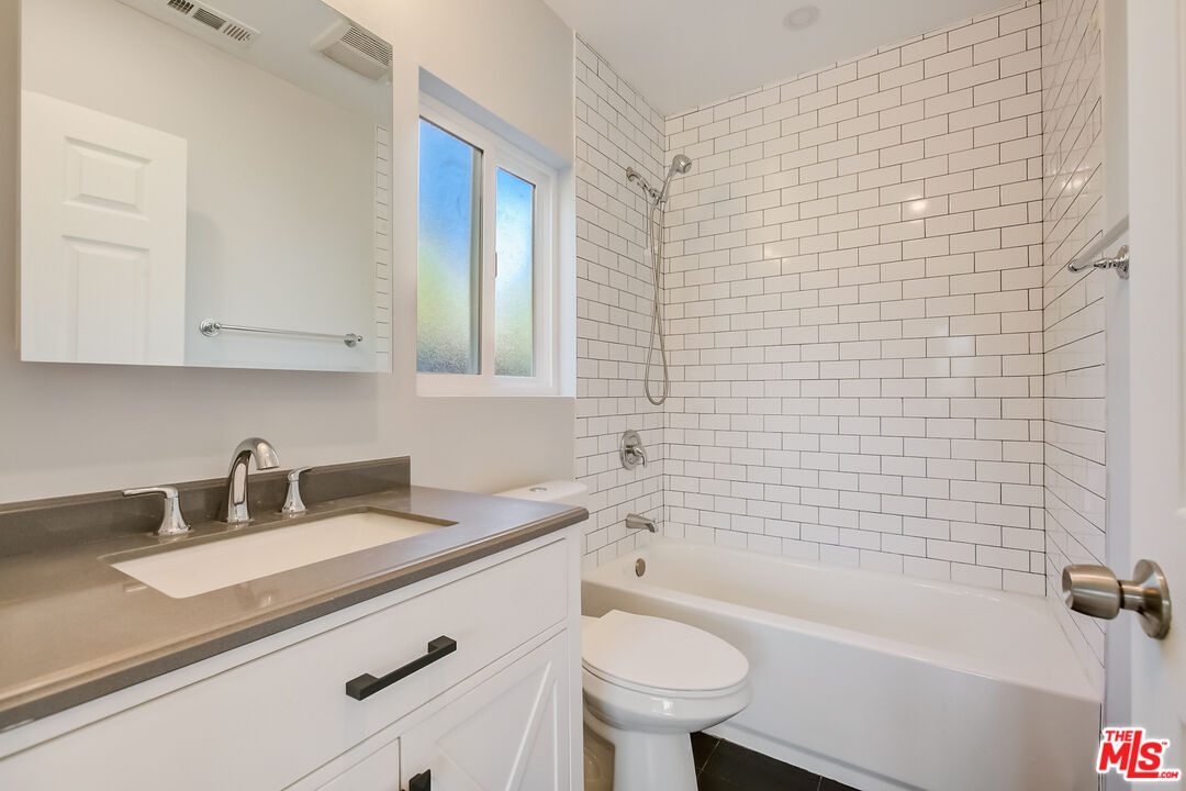 2019 Broach Avenue Duarte, CA 91010 - Photo 6 of 35 a bathroom with a sink a toilet and bathtub