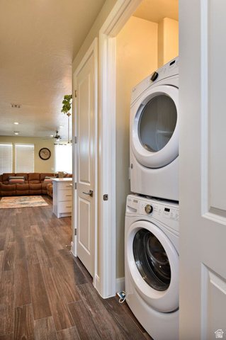 1622 Canyon Tree Drive St. George, UT 84770 - Photo 27 of 34 Dedicated laundry area featuring a stacked washer and dryer