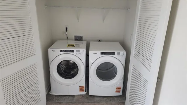 a view of a balcony with a floor to ceiling window