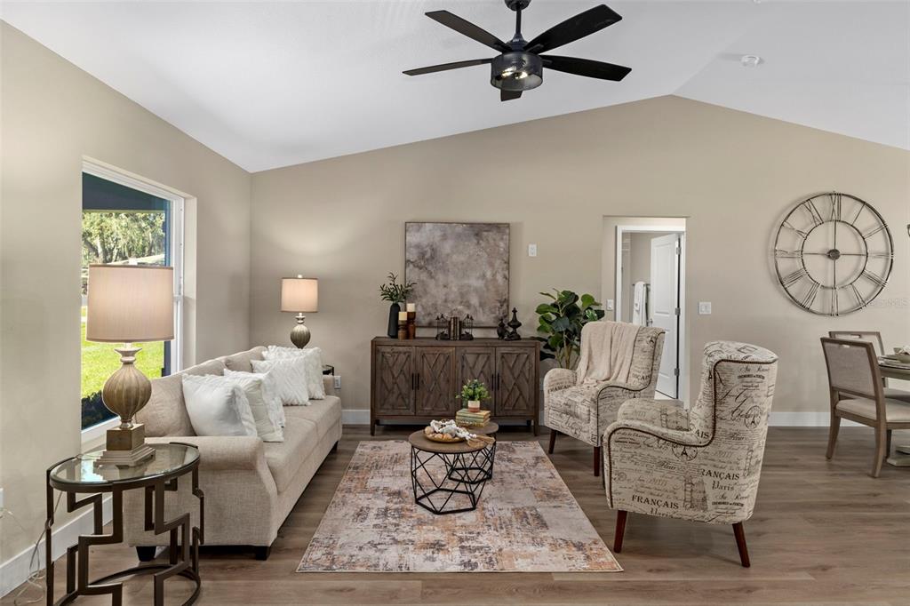3011 East Griffin Street Inverness, FL 34453 - Photo 13 of 45 a living room with furniture and wooden floor