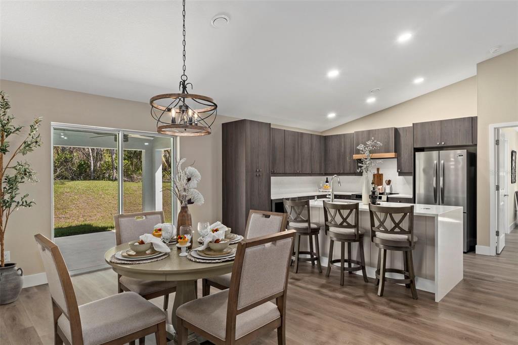 3011 East Griffin Street Inverness, FL 34453 - Photo 17 of 45 a view of a dining room with furniture window and wooden floor