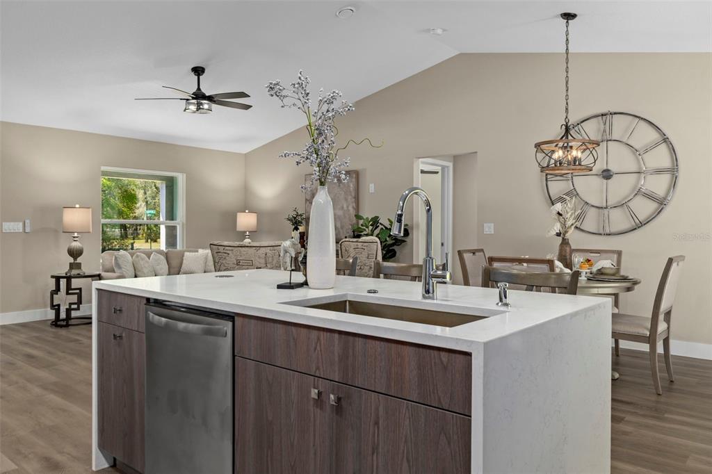 3011 East Griffin Street Inverness, FL 34453 - Photo 22 of 45 a room with a sink and a chandelier