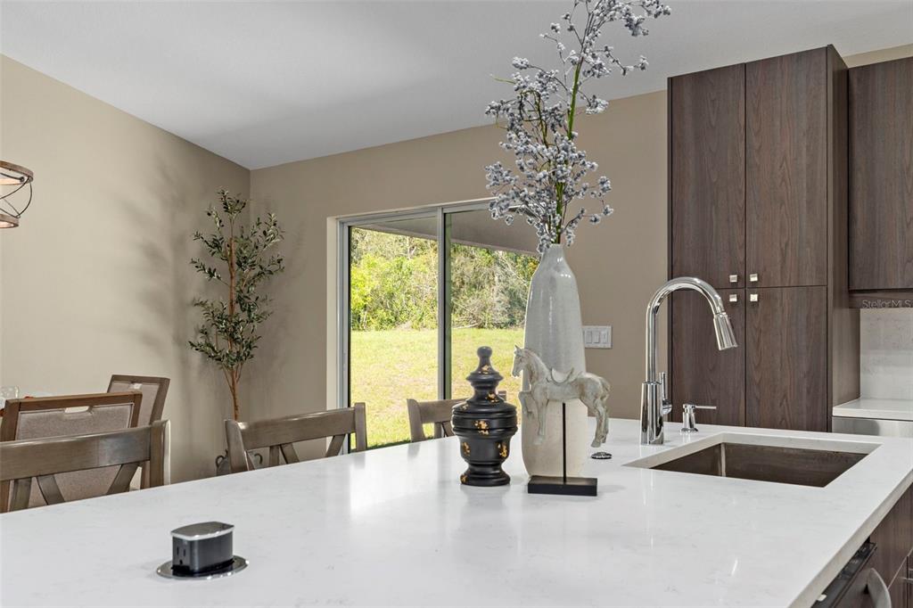 3011 East Griffin Street Inverness, FL 34453 - Photo 23 of 45 a bathroom with a double vanity sink and a mirror